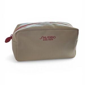 Shiseido Beige Toiletry Pouch with Red Accents